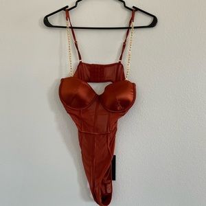 Fashion Nova Body Suit. Size Medium. Rust color. Brand New, Never Worn